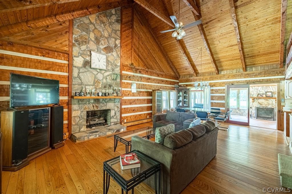 14041 County Line Road Keysville, VA 23947 - Photo 4 of 10 a living room with fireplace furniture and a floor to ceiling window