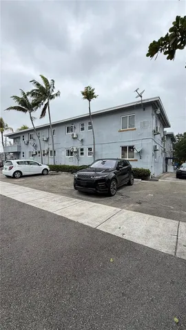 a cars parked in front of a house