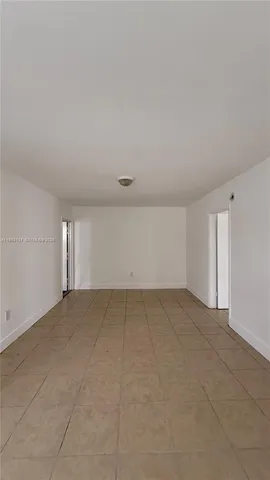 an empty room with a natural light