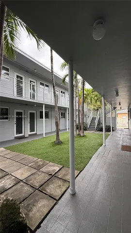 a view of a yard in front of a house