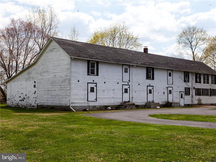 77 Petty Road Cranbury, NJ 08512 - Photo 11 of 32 a front view of house with yard