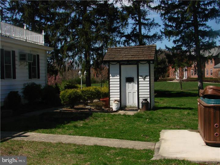 77 Petty Road Cranbury, NJ 08512 - Photo 32 of 32 a view of a house with a yard