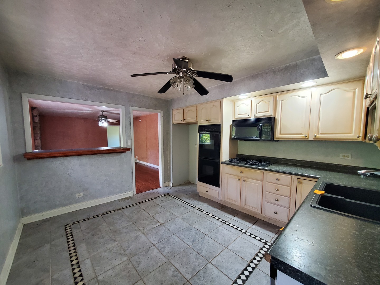 20601 Parthenon Way Olympia Fields, IL 60461 - Photo 16 of 36 a kitchen with granite countertop a stove a sink and a refrigerator