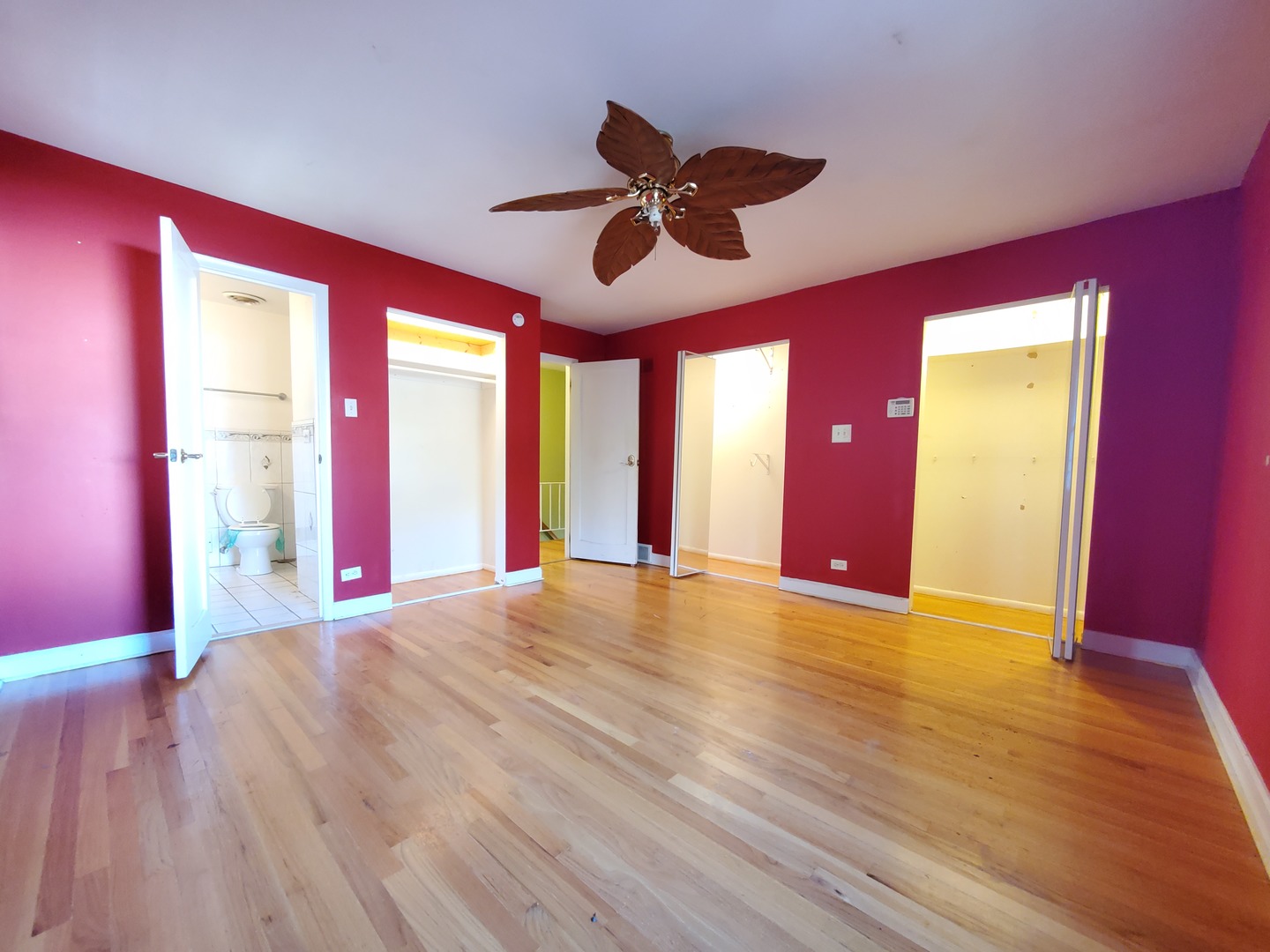 20601 Parthenon Way Olympia Fields, IL 60461 - Photo 20 of 36 a view of an empty room with window and wooden floor