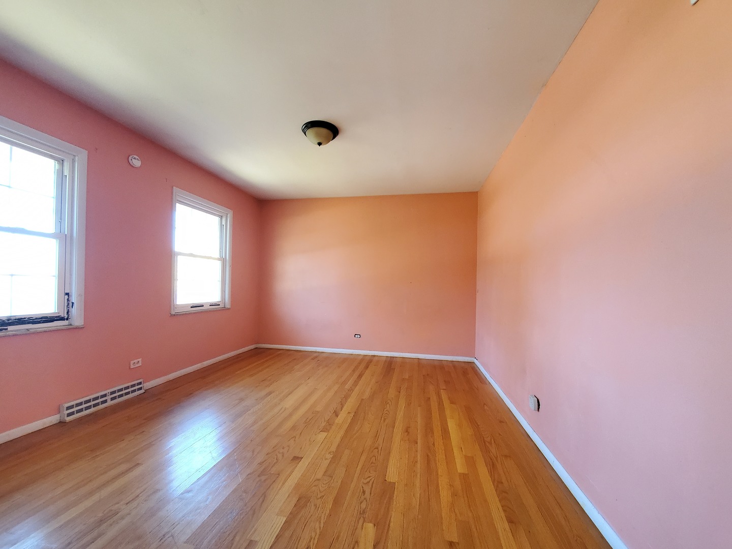 20601 Parthenon Way Olympia Fields, IL 60461 - Photo 22 of 36 an empty room with wooden floor and windows
