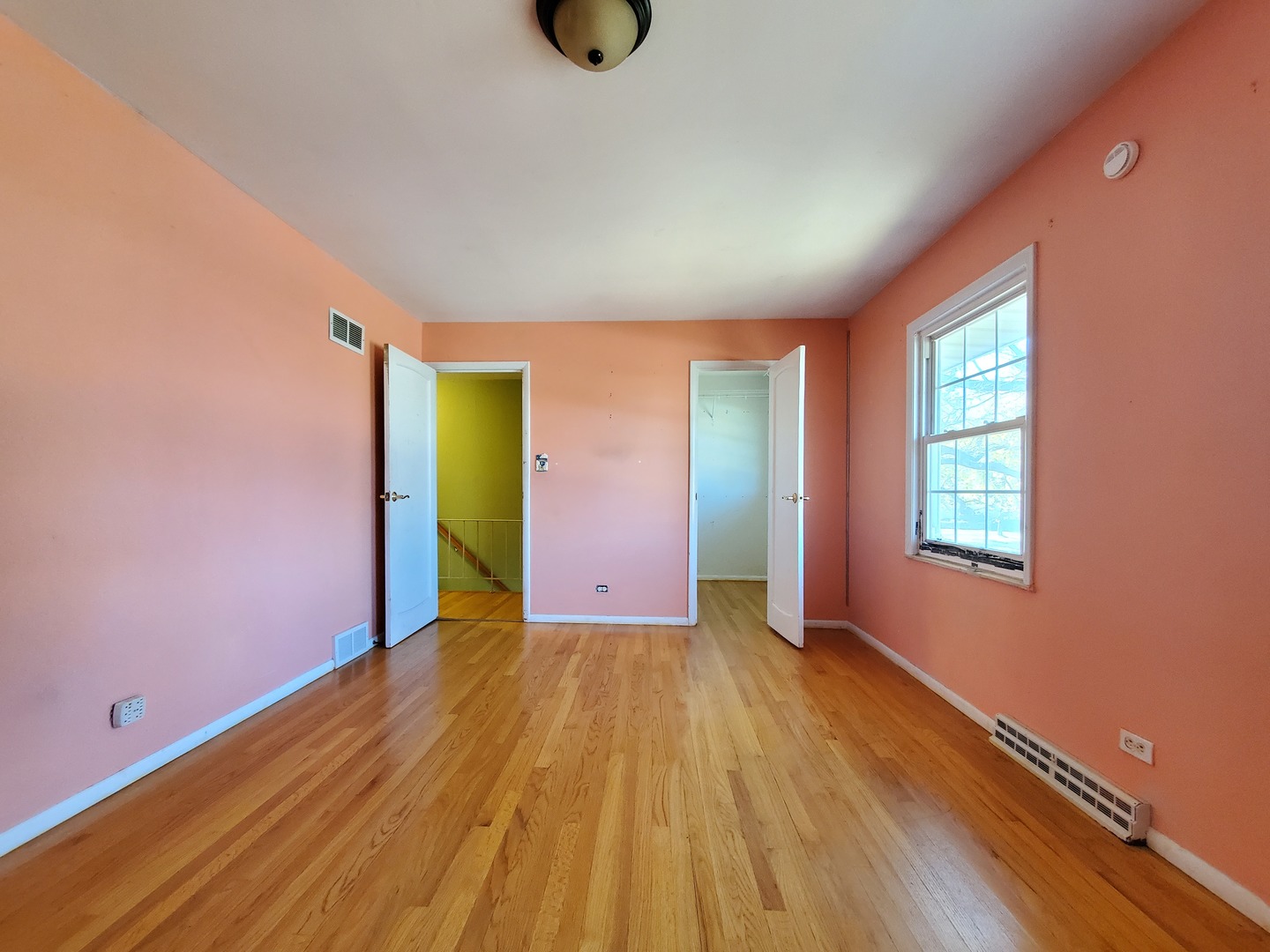 20601 Parthenon Way Olympia Fields, IL 60461 - Photo 23 of 36 a view of an empty room with wooden floor and a window