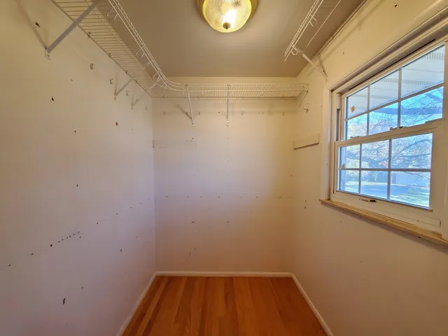 a view of a room with a window