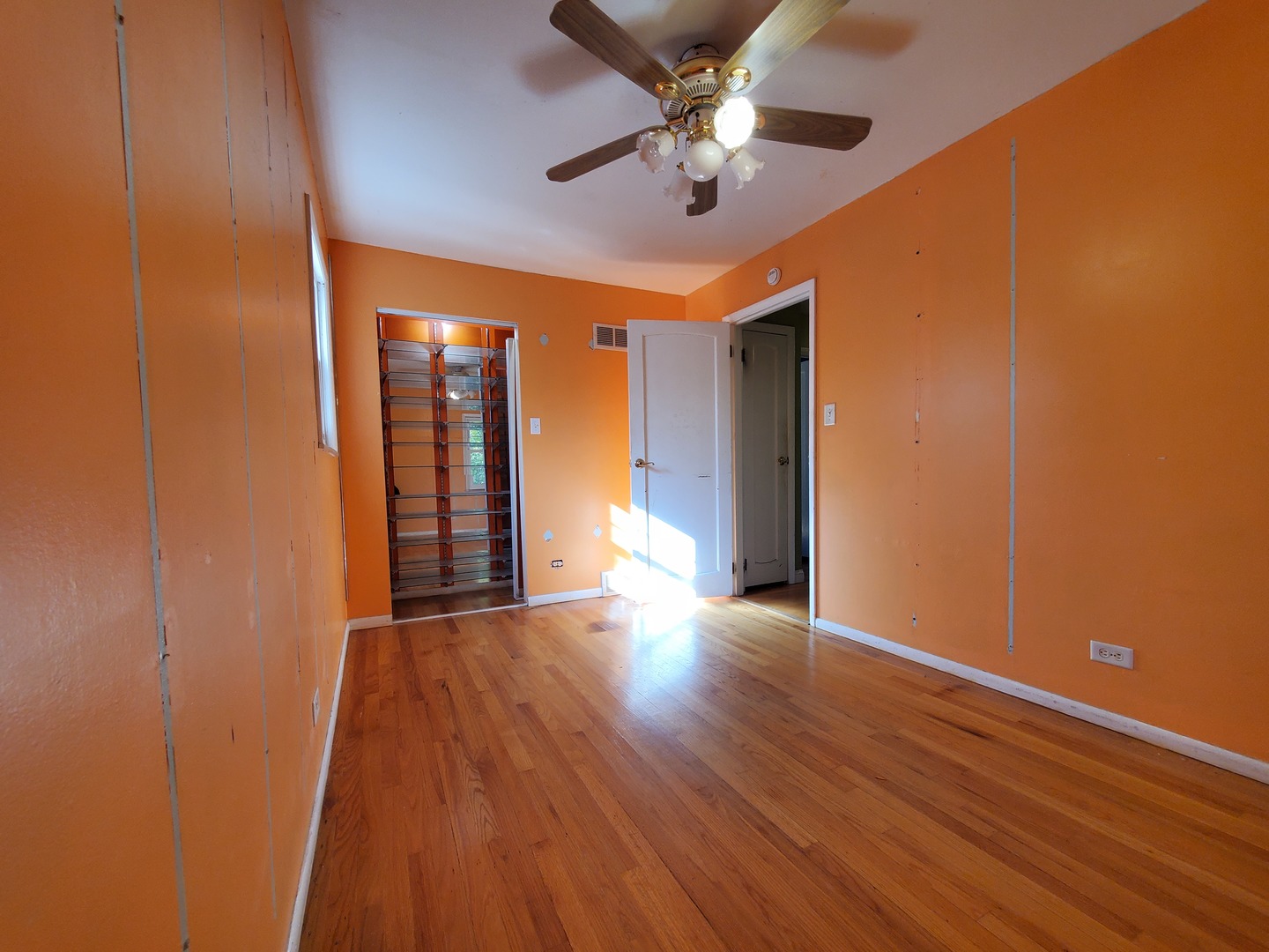 20601 Parthenon Way Olympia Fields, IL 60461 - Photo 28 of 36 an empty room with wooden floor and windows