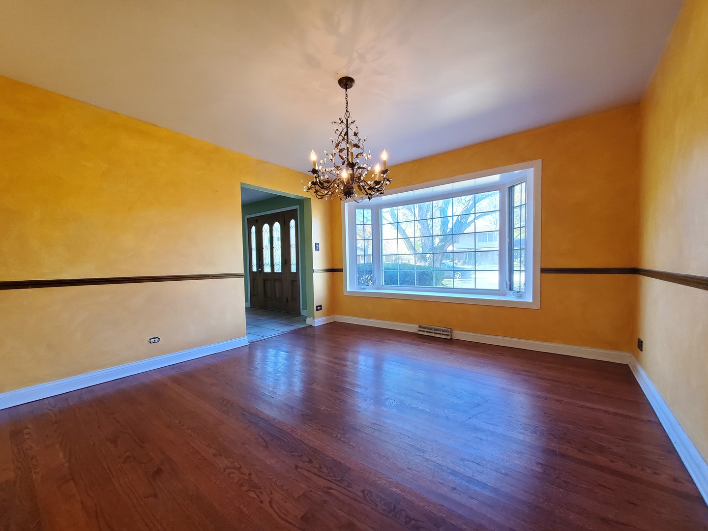 20601 Parthenon Way Olympia Fields, IL 60461 - Photo 9 of 36 a view of livingroom with hardwood floor and window