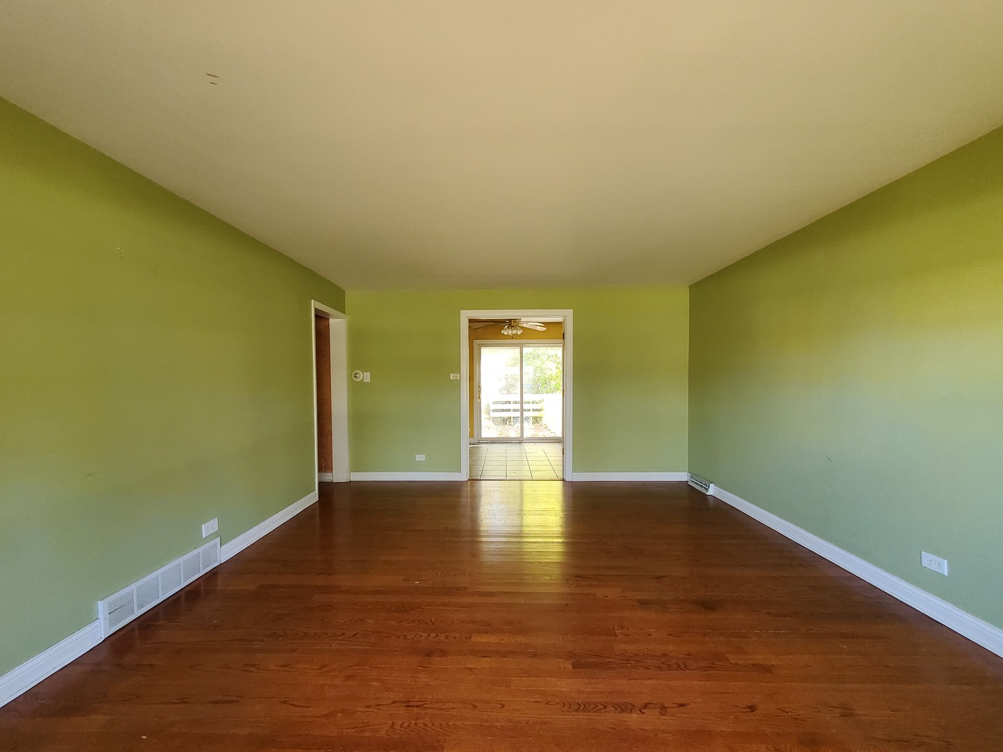 20601 Parthenon Way Olympia Fields, IL 60461 - Photo 10 of 36 a view of empty room with wooden floor and fan
