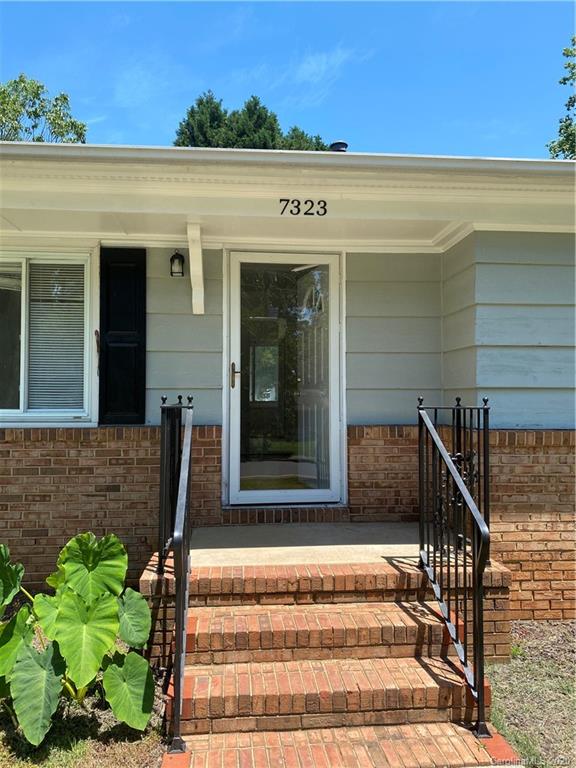 7323 Idlewild Road Charlotte, NC 28212 - Photo 2 of 13 a view of a entryway door front of house