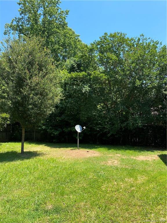 7323 Idlewild Road Charlotte, NC 28212 - Photo 13 of 13 a view of an outdoor space and a yard