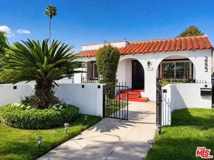 a front view of a house with a porch