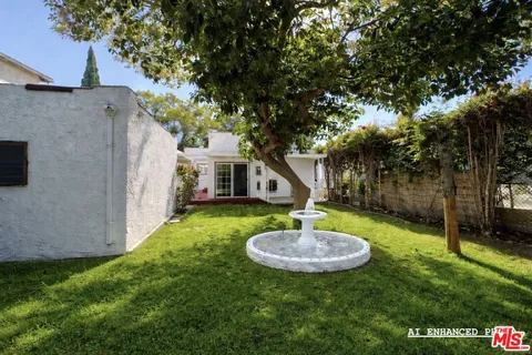 a view of a backyard with a trampoline