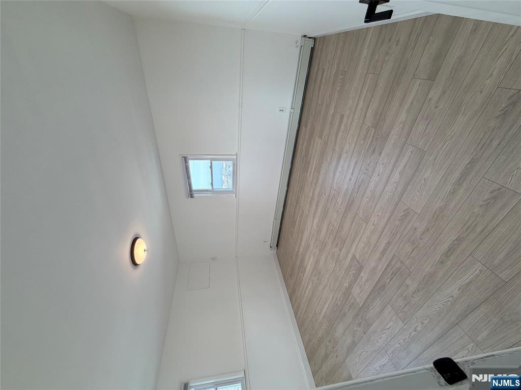 157 Cottage Place, Unit 2 Fairview, NJ 07022 - Photo 24 of 33 wooden floor in a room