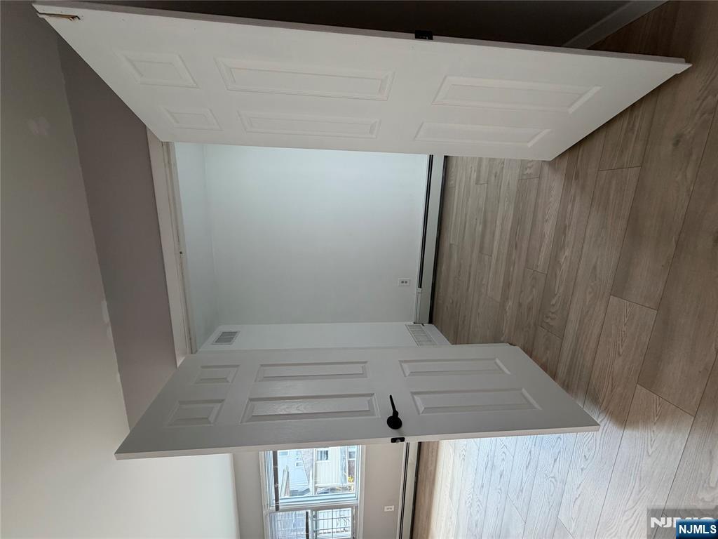 157 Cottage Place, Unit 2 Fairview, NJ 07022 - Photo 30 of 33 a view of an empty room