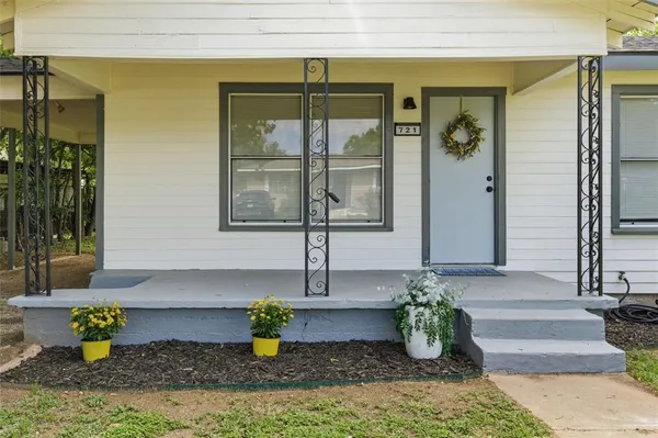 a front view of a house with patio
