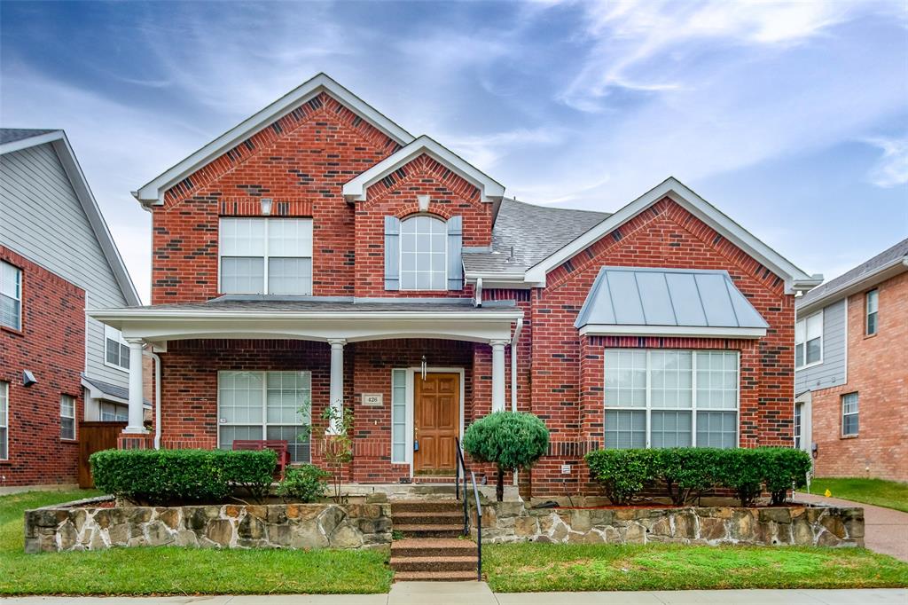 426 Richmond Street Irving, TX 75063 - Photo 1 of 33 a front view of a house with garden