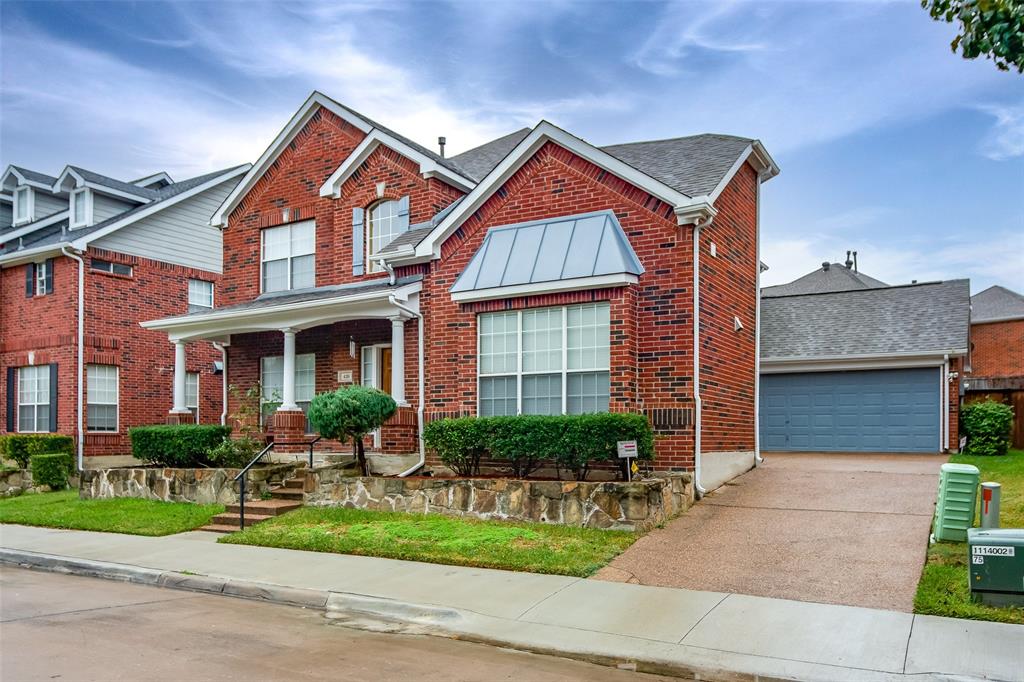 426 Richmond Street Irving, TX 75063 - Photo 2 of 33 a front view of a house with garden