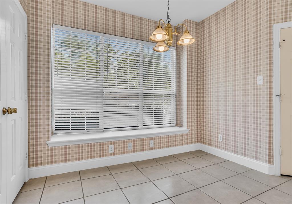 426 Richmond Street Irving, TX 75063 - Photo 21 of 33 a view of an empty room with a window