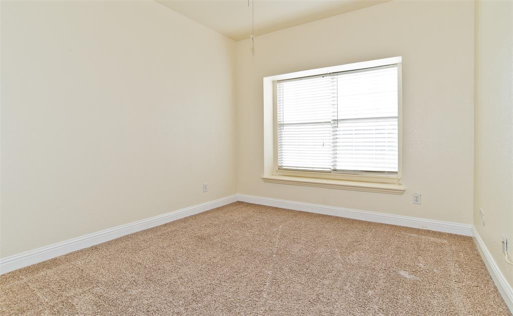 426 Richmond Street Irving, TX 75063 - Photo 30 of 33 an empty room with a window
