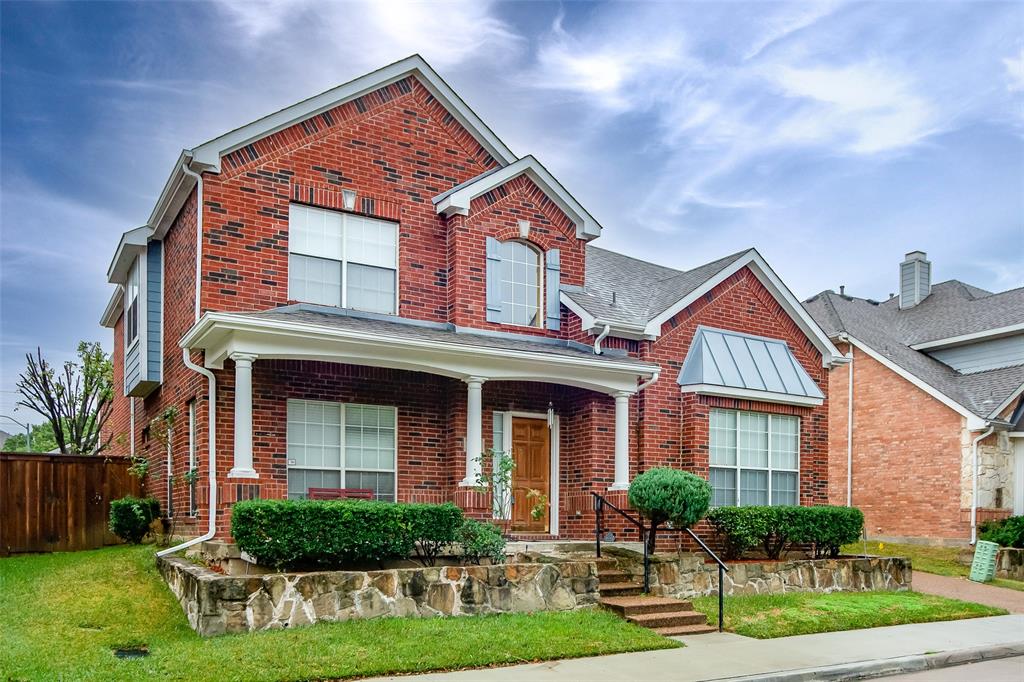 426 Richmond Street Irving, TX 75063 - Photo 3 of 33 a front view of a house with garden
