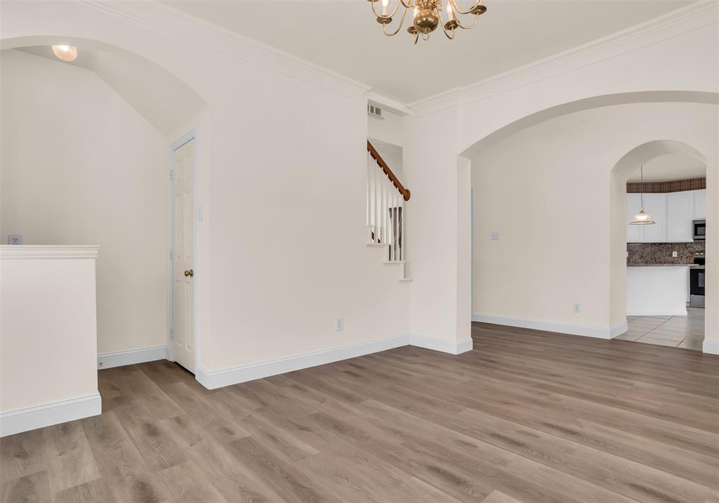 426 Richmond Street Irving, TX 75063 - Photo 6 of 33 a view of empty room with wooden floor