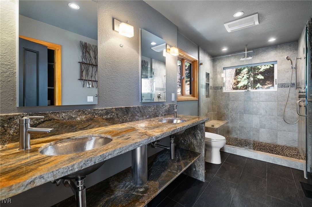 1014 Saturn Court Incline Village, NV 89451 - Photo 21 of 41 a bathroom with a sink and a mirror