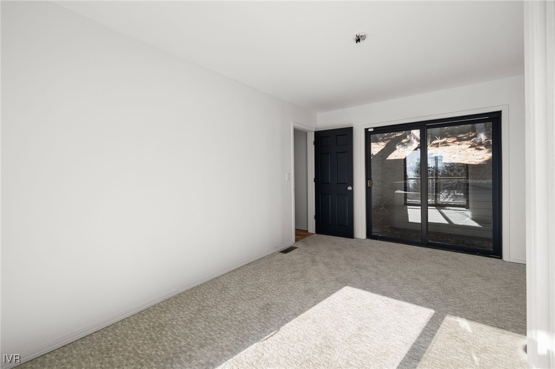 1014 Saturn Court Incline Village, NV 89451 - Photo 31 of 41 a view of an empty room with a window
