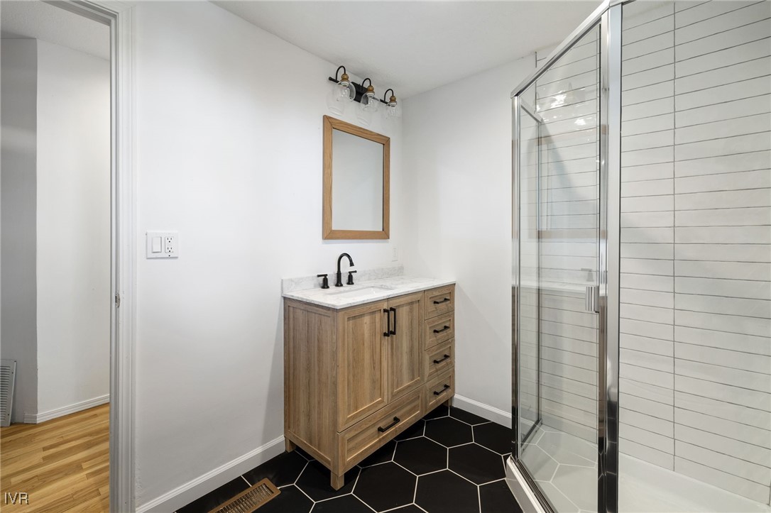 1014 Saturn Court Incline Village, NV 89451 - Photo 32 of 41 a bathroom with a sink and a mirror