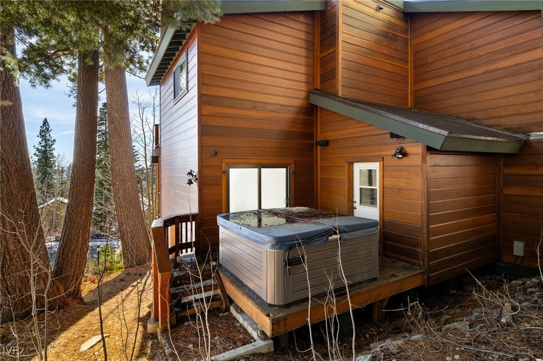 1014 Saturn Court Incline Village, NV 89451 - Photo 33 of 41 a patio with table and chairs and potted plants
