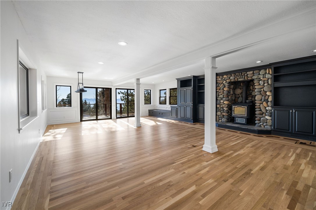 1014 Saturn Court Incline Village, NV 89451 - Photo 5 of 41 a view of a hall with wooden floor and a fireplace