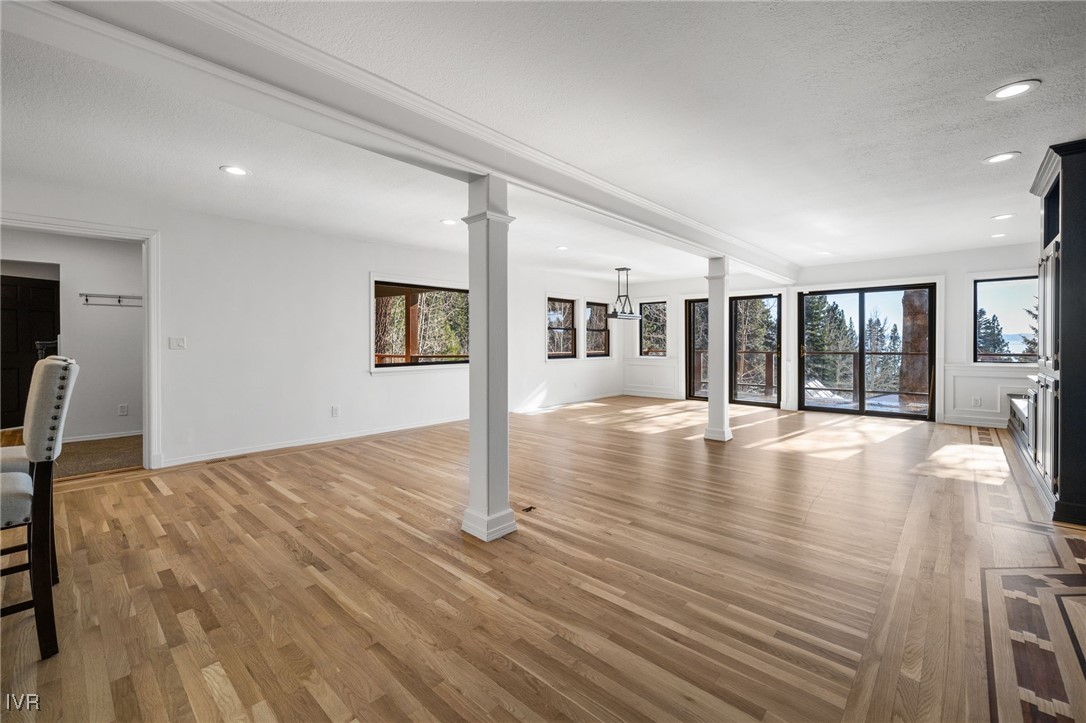 1014 Saturn Court Incline Village, NV 89451 - Photo 7 of 41 a view of a livingroom with wooden floor and large window