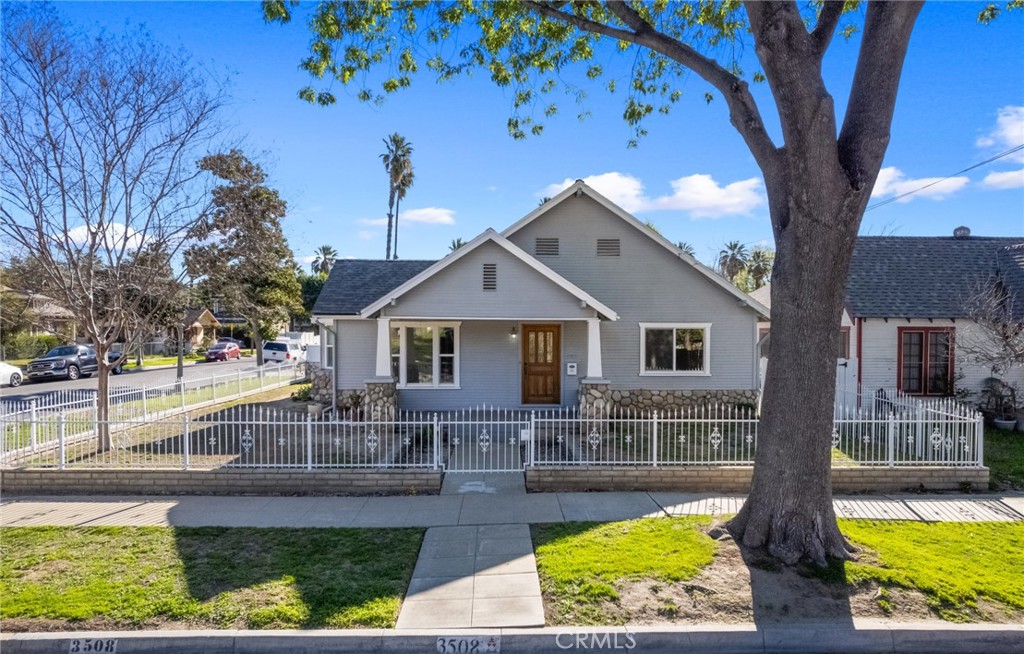 3508 Locust Street Riverside, CA 92501 - Photo 1 of 1 a front view of house with yard and outdoor seating