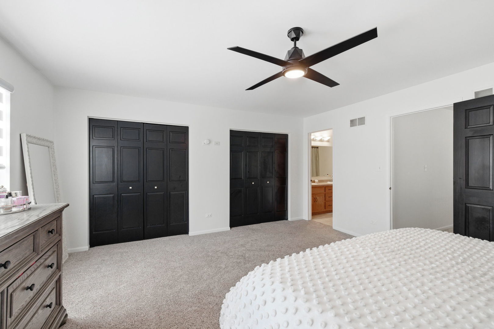 19320 Tramore Lane Mokena, IL 60448 - Photo 14 of 28 a bedroom with a bed and a dresser