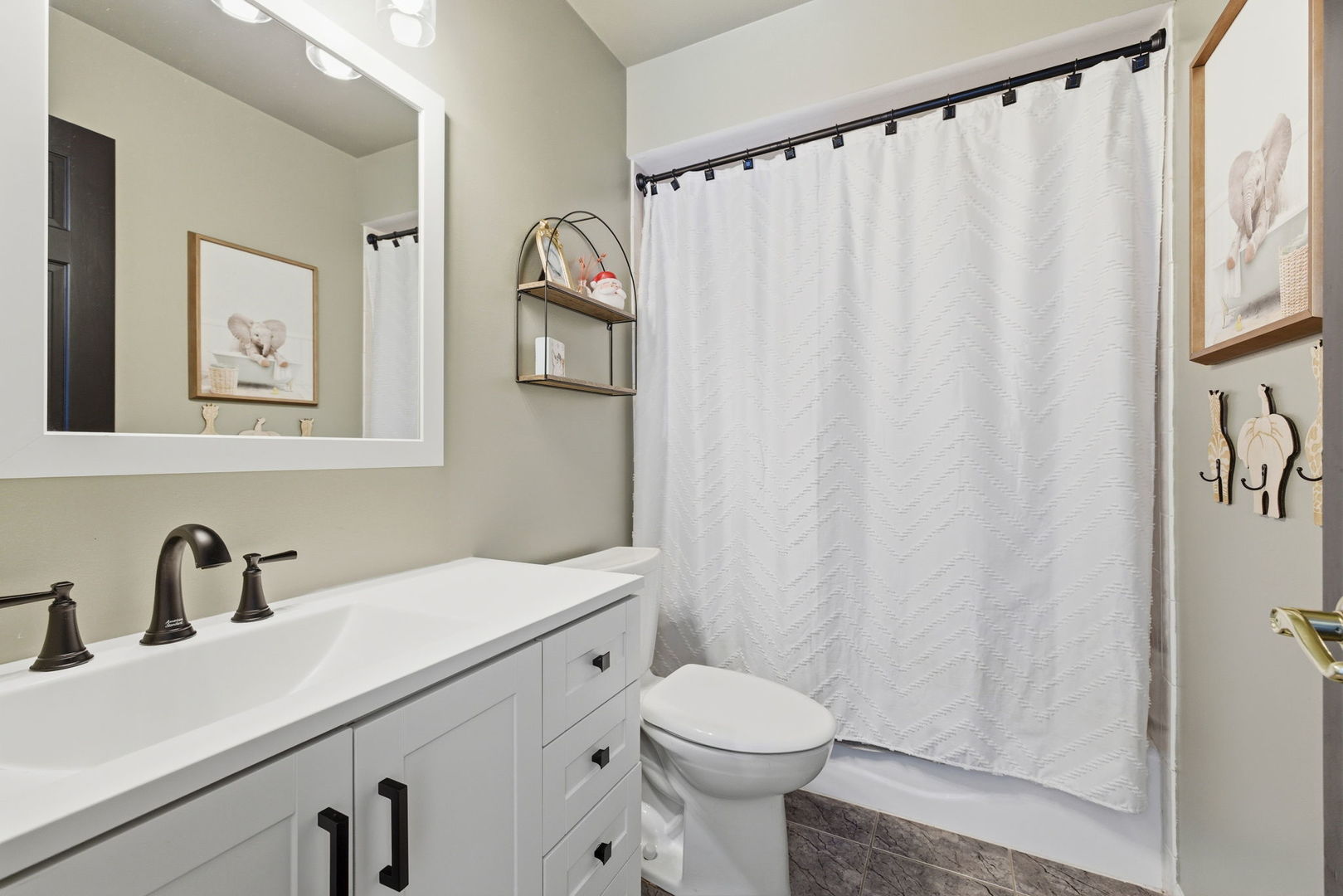 19320 Tramore Lane Mokena, IL 60448 - Photo 16 of 28 a bathroom with a sink a toilet and a mirror