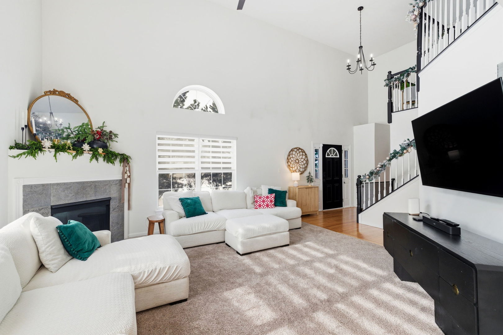 19320 Tramore Lane Mokena, IL 60448 - Photo 4 of 28 a living room with furniture a fireplace and a flat screen tv