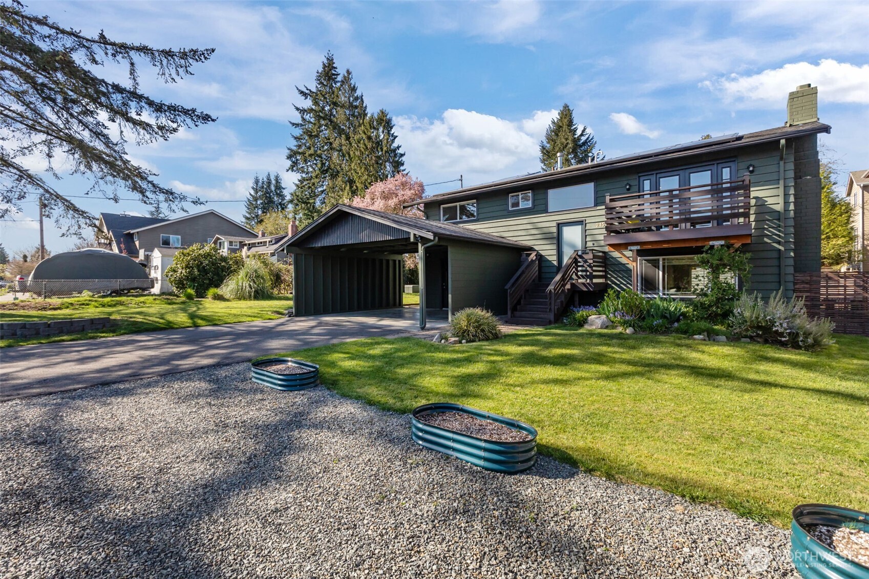 215 Hubbard Road Lynnwood, WA 98036 - Photo 1 of 40 a front view of a house with garden
