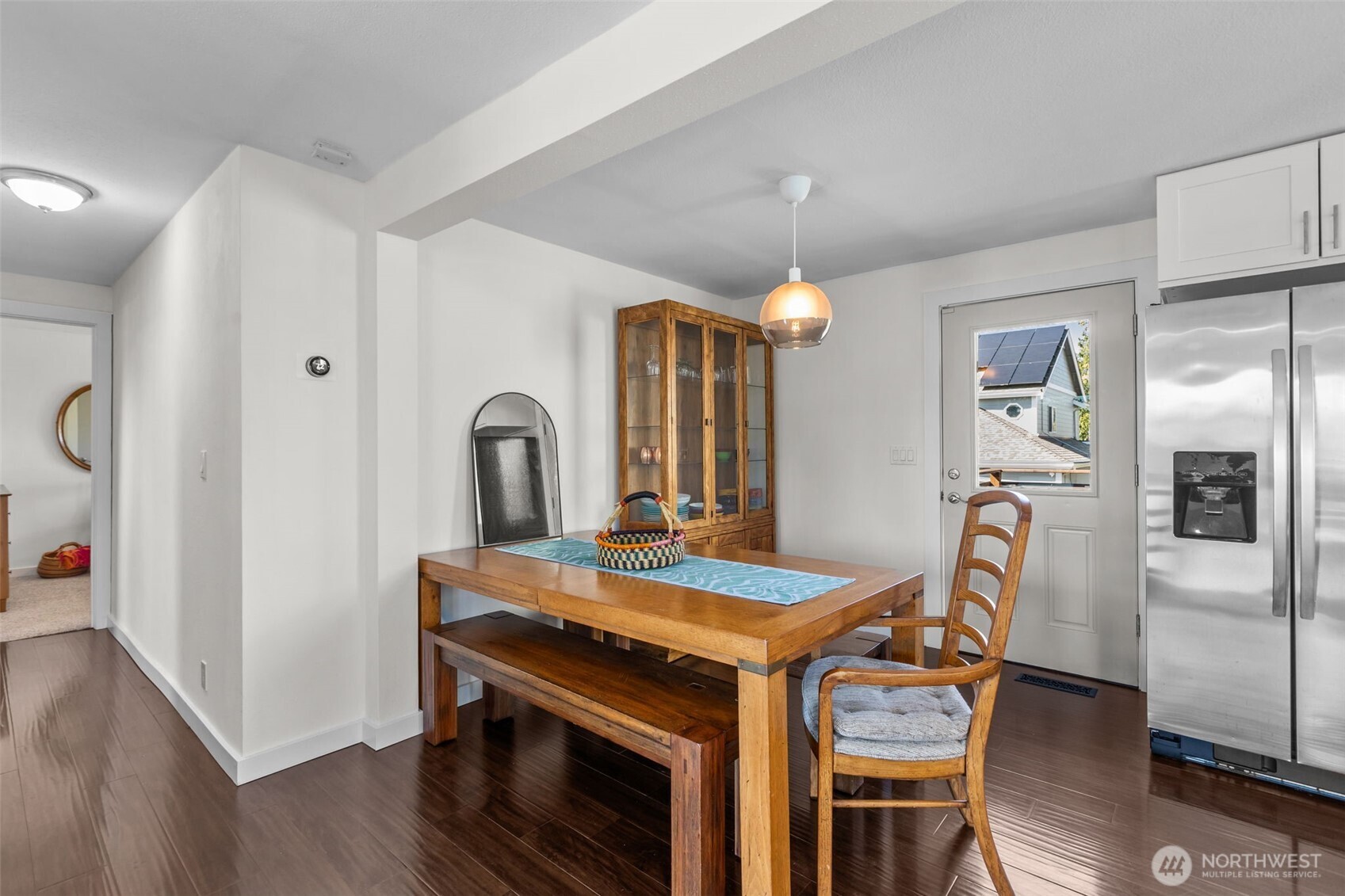 215 Hubbard Road Lynnwood, WA 98036 - Photo 11 of 40 a view of dining room and kitchen with a table chairs