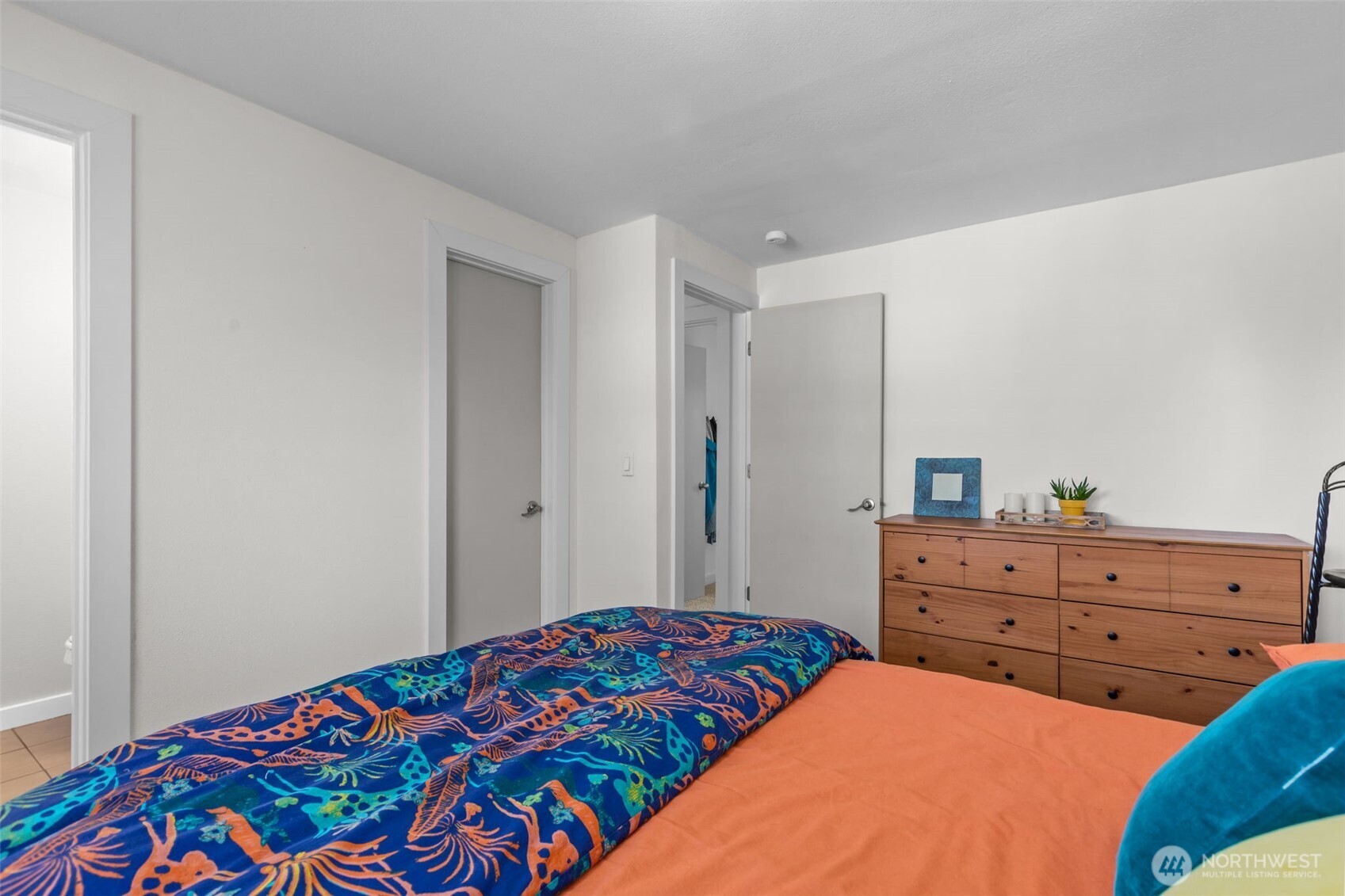 215 Hubbard Road Lynnwood, WA 98036 - Photo 14 of 40 a bedroom with a bed and a dresser