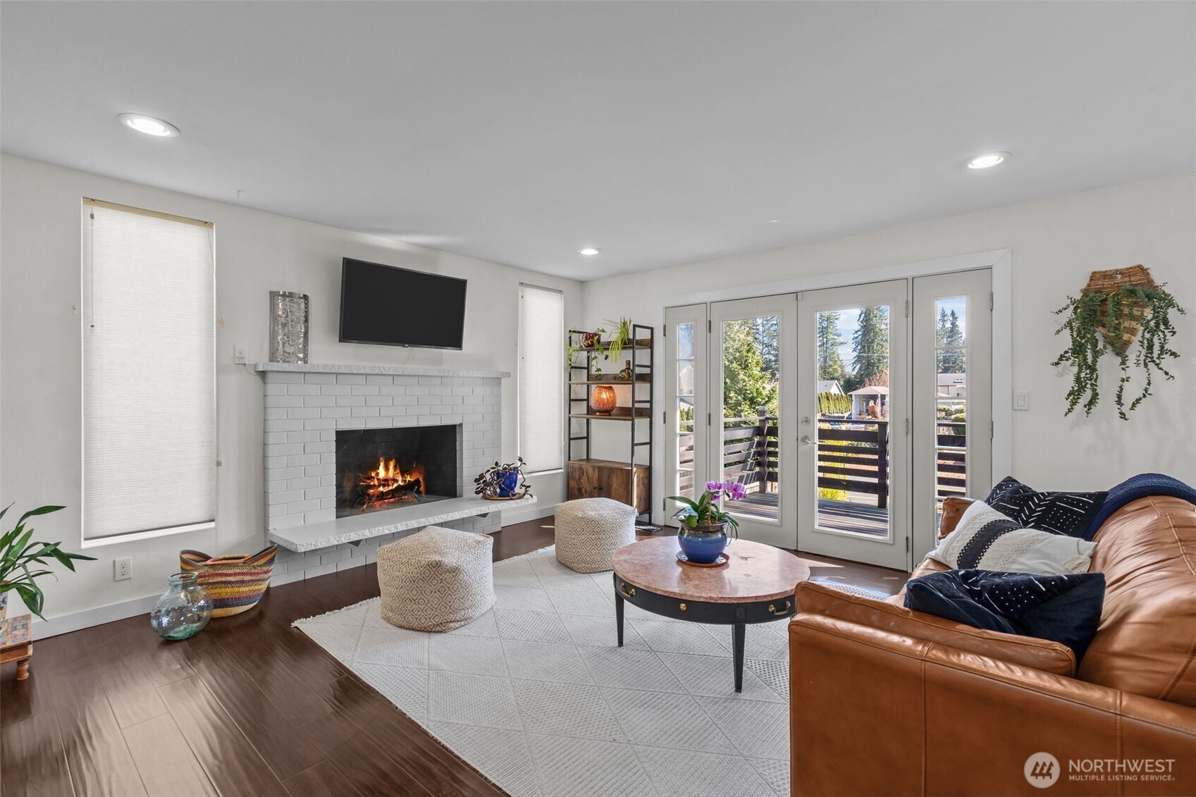 215 Hubbard Road Lynnwood, WA 98036 - Photo 2 of 40 a living room with furniture and a fireplace