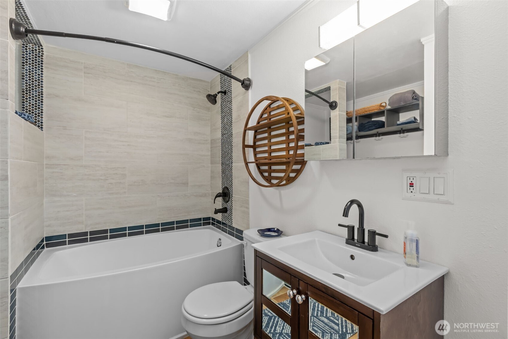 215 Hubbard Road Lynnwood, WA 98036 - Photo 22 of 40 a bathroom with a sink and a mirror