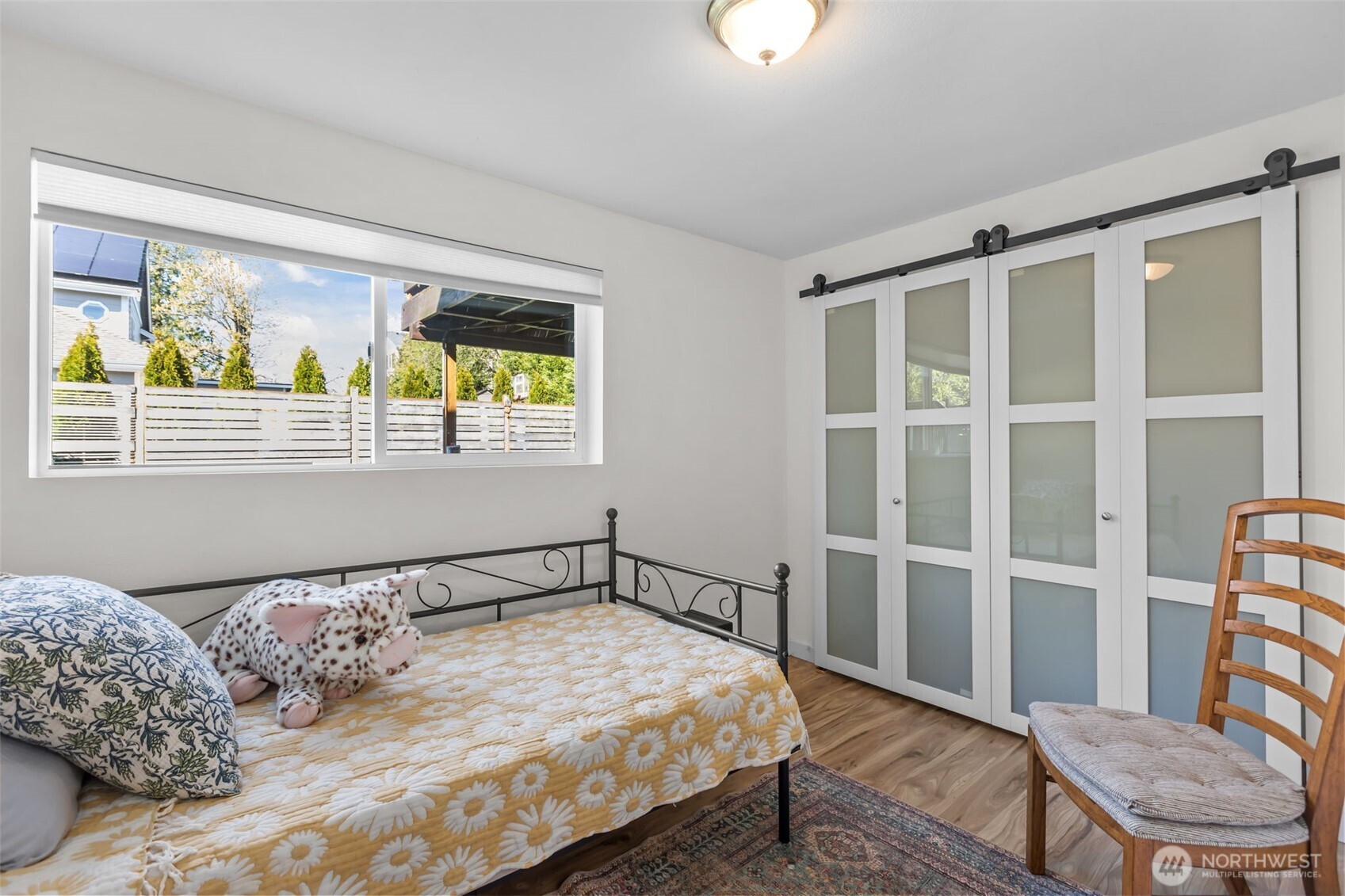 215 Hubbard Road Lynnwood, WA 98036 - Photo 23 of 40 a bedroom with a bed and a window