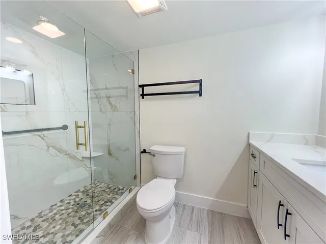 a view of a street with a car park in front of it