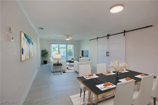 a view of a kitchen with a sink and cabinets