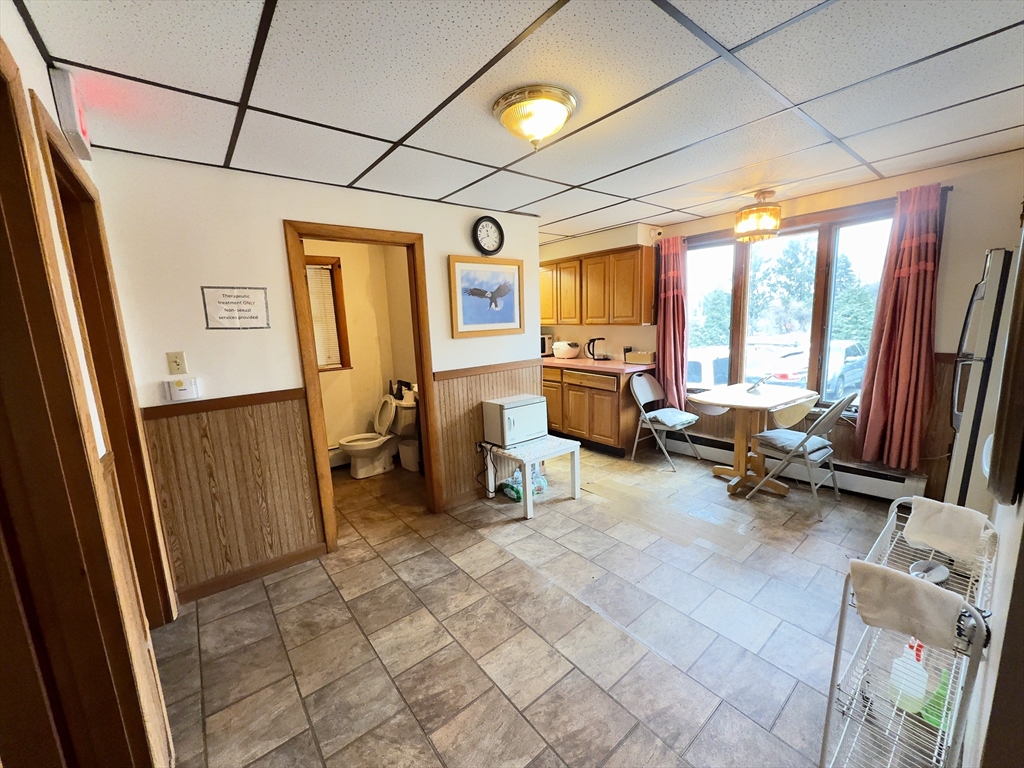 328 Brooks Street Worcester, MA 01606 - Photo 12 of 32 a view of a livingroom with couch and a window