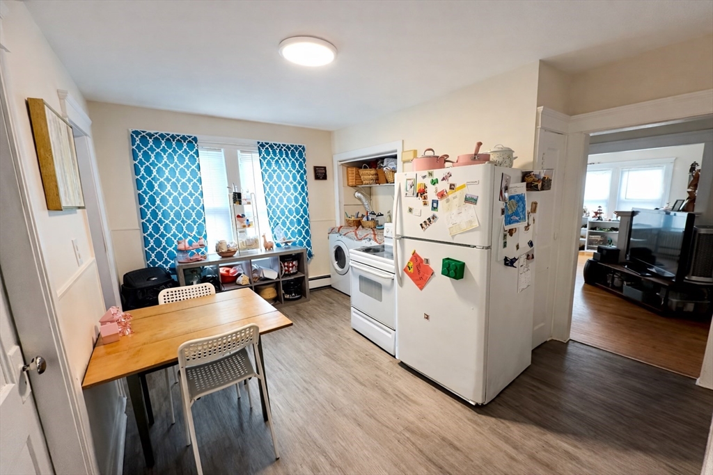 328 Brooks Street Worcester, MA 01606 - Photo 20 of 32 a living room with furniture and a table