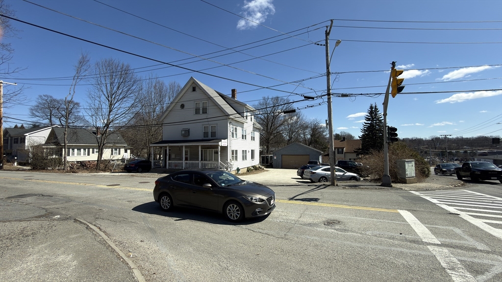 328 Brooks Street Worcester, MA 01606 - Photo 2 of 32 a car parked in front of garage