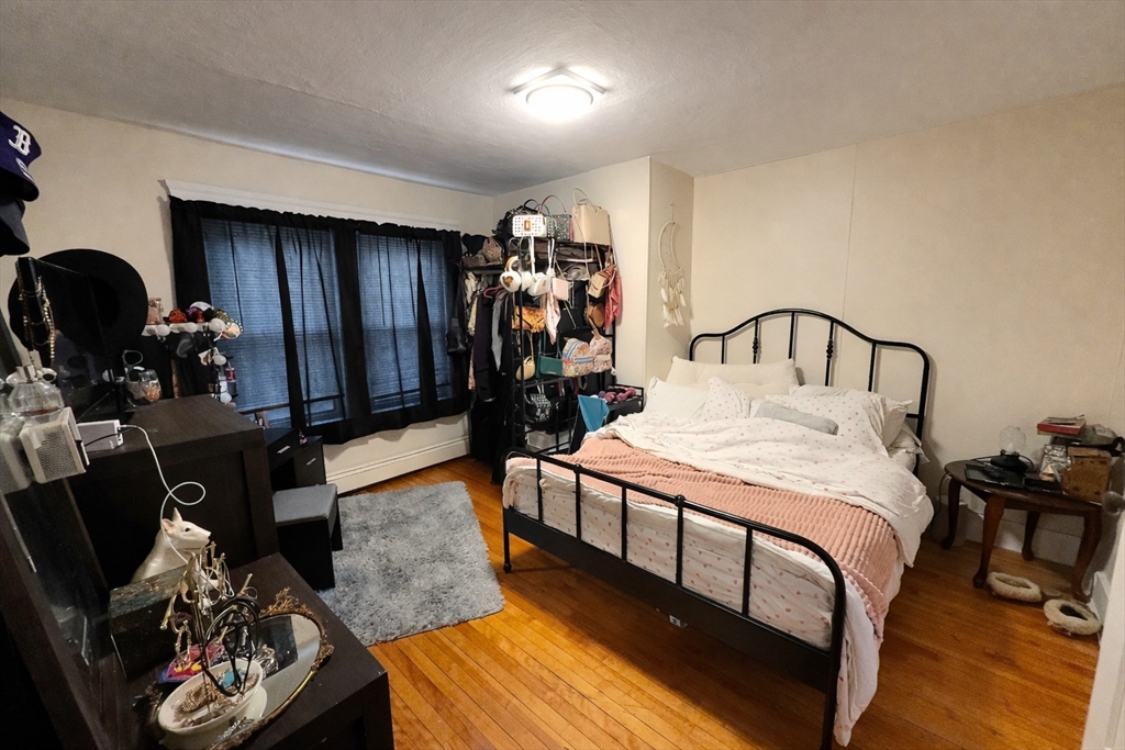 328 Brooks Street Worcester, MA 01606 - Photo 22 of 32 a bedroom with furniture and a window
