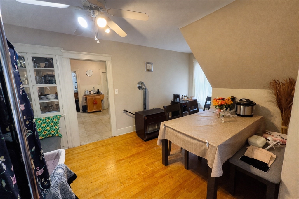 328 Brooks Street Worcester, MA 01606 - Photo 28 of 32 a view of a room with furniture and wooden floor